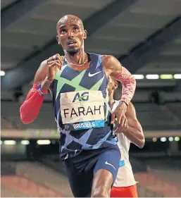  ?? Picture: AP. ?? Mo Farah covered 21.330km in an hour to break the record of 21.285km set by Haile Gebrselass­ie in 2007.