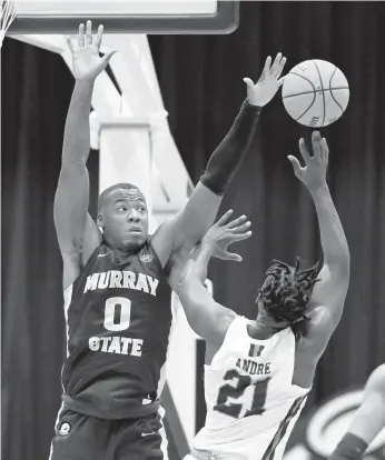  ?? MARK ZALESKI/AP ?? KJ Williams leads the Murray State Racers, who enter the NCAA Tournament on a 20-game winning streak.