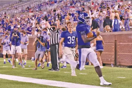  ?? STAFF FILE PHOTO BY MATT HAMILTON ?? McCallie’s Kenzy Paul scores a touchdown against Baylor at Finley Stadium on October 2.
