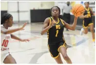  ?? (Special to the Commercial/William Harvey) ?? Watson Chapel sophomore Maranda Emerson drives the basketball against White Hall junior Macie Lambert on Tuesday night.