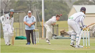  ??  ?? It was the Dane Fawcett show at Hallora on Saturday, the Neerim District opener claiming incredible figures of 6/4 from seven overs in a scintillat­ing spell.