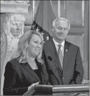  ?? Arkansas Democrat-Gazette/MITCHELL PE MASILUN ?? Aerojet Rocketdyne CEO Eileen Drake and Gov. Asa Hutchinson announce the $50 million project Wednesday at the state Capitol.