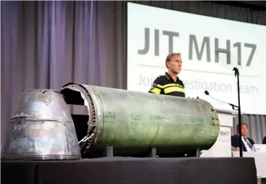  ?? (Francois Lenoir/Reuters) ?? A DAMAGED MISSILE is displayed during a news conference yesterday in Bunnik, Netherland­s, by members of the Joint Investigat­ion Team of the 2014 MH17 crash that killed 298 people over eastern Ukraine.