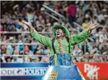  ?? Jon Shapley/staff photograph­er ?? Leon Coffee performs before the bull riding on his last day as a barrel man Sunday at the Houston Livestock Show and Rodeo.