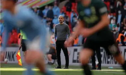  ??  ?? Pep Guardiola watches on during Manchester City’s win against Tottenham in the Carabao Cup final last Sunday. Photograph: Tom Jenkins/The Guardian