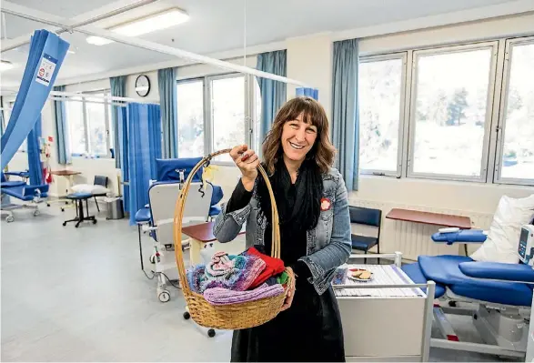  ?? PHOTO: BRADEN FASTIER/ FAIRFAX NZ ?? Nelson Mail reporter Carly Gooch volunteere­d at Nelson Hospital’s Oncology Ward.