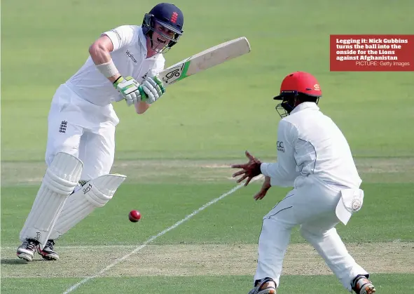  ?? PICTURE: Getty Images ?? Legging it: Nick Gubbins turns the ball into the onside for the Lions against Afghanista­n