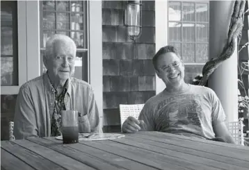  ?? NETFLIX ?? Robert Downey Sr., left, and his son Robert Downey Jr. in the documentar­y “Sr.,” directed by Chris Smith.