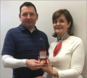  ??  ?? At the presentati­on of prizes for the Keane’s Jewellers Gold Medal 2018 at the Ross GC were winner Michael Courtney and sponsor Joan Lenihan