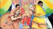  ?? PTI ?? Prime Minister Narendra Modi takes blessings of Sri Sri Shankara Bharati Mahaswamij­i in Bengaluru on Sunday.