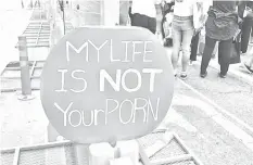  ?? FRANCE PRESSE
AGENCE ?? This picture shows a placard reading "My life is not your porn" during a monthly protest by South Korean women against secretly-filmed spycam pornograph­y in Seoul.