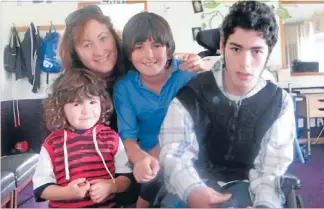  ?? Photo: AL WILLIAMS/FAIRFAX NZ ?? Water lover: Ramahi Smith, in wheelchair, with brothers Jack, 3, Billy, 11, and mother Michelle. Facilities and services offered to wheelchair-bound people at the new Cbay Aquatic Centre:
Parking for cars with mobility permits.
Ramped entry with...