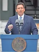  ?? LYNNE SLADKY/AP ?? Florida Gov. Ron DeSantis raises his concerns over woke-related issues.