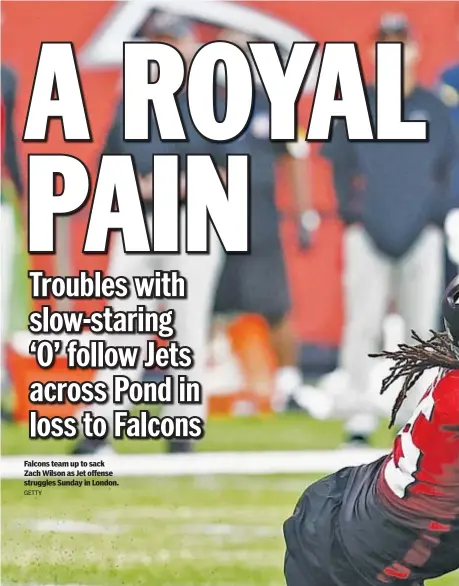  ?? GETTY ?? Falcons team up to sack Zach Wilson as Jet offense struggles Sunday in London.