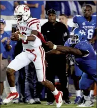  ?? AP/JAMES CRISP ?? Western Kentucky quarterbac­k Kawaun Jakes (left) doesn’t have outstandin­g numbers, but Hilltopper­s Coach Willie Taggart said the offense is running as it should.