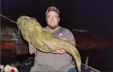  ?? James Swearingen ?? James Swearingen of Windgap caught and released this flathead catfish in the Ohio River on Aug. 30.