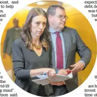  ?? Photo / Mark Mitchell ?? Jacinda Ardern and Grant Robertson say today’s Budget is just the beginning of support.