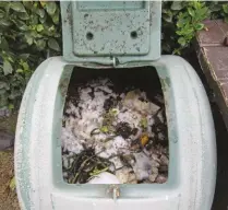  ??  ?? this compost tumbler has bokashi added. You can clearly see a mycelium web growing after just a few days.