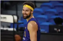  ?? SHMUEL THALER — SANTA CRUZ SENTINEL, FILE ?? Warriors star Klay Thompson is all smiles as he works out at Kaiser Permanente Arena in Santa Cruz on Nov. 29.