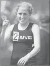  ?? COURANT FILE PHOTO ?? Crevoisera­t reacts after winning the girls mile at the 2009 Hartford Public Invitation­al.