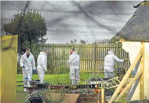  ?? Picture: Getty Images. ?? Police forensic officers begin excavating the Inverkip garden of Margaret Fleming, who was reported missing six week ago.