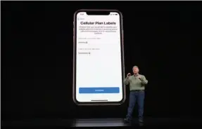  ??  ?? Apple’s Phil Schiller explains the dual SIM support in the iphone XS.