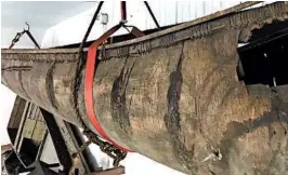  ?? LARISSA VIGUE PICARD/PEJEPSCOT HISTORICAL SOCIETY ?? A Wabanaki-made birch-bark canoe, shown in a barn behind a Maine historical society museum, will be restored.