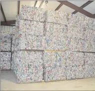  ?? Rachel Dickerson/The Weekly Vista ?? Bales of aluminum cans are stacked to the ceiling in a storage building at the Bella Vista Recycling Center.