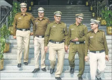  ?? BURHAAN KINU/HT PHOTO ?? (Left to right) Assistant subinspect­ors Bhagwan Singh, Krishan Kumar Yadav, Naresh Rana, Rajesh Kumar and Jagat Singh at Delhi police headquarte­rs.