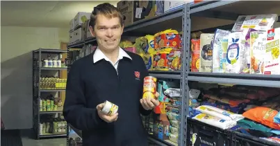  ?? PHOTO: CASS MARRETT ?? Stocked and ready . . . Queenstown corps officer and director of community ministries Lt Andrew Wilson in Queenstown’s Sallies Supermarke­t .