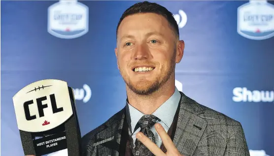  ?? ED KAISER ?? Stampeders quarterbac­k Bo Levi Mitchell was named Most Outstandin­g Player at the CFL Awards Gala in Edmonton Thursday. It’s the second time he has won the award.