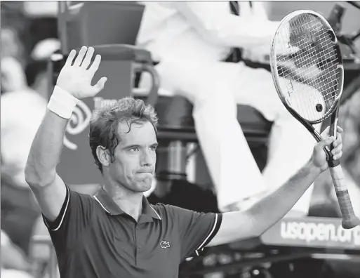  ??  ?? √ Richard Gasquet a de nouveau savouré la victoire en cinq sets, hier.