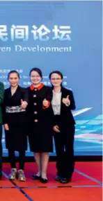 ?? ?? Participan­ts at the Belt and Road Civil Forum for Women and Children Developmen­t pose for a group photo in Beijing on October 20