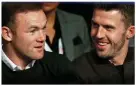  ??  ?? Rooney and his sparring partner Carrick looked happier at Anthony Crolla’s fight on Saturday night