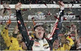  ?? JOHN RAOUX — THE ASSOCIATED PRESS ?? Erik Jones celebrates in Victory Lane after winning the NASCAR Cup Series race at Daytona Internatio­nal Speedway on July 7 in Daytona Beach, Fla.