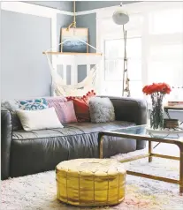  ??  ?? A living room designed by Caitlin Murray, founder of Black Lacquer Design in Los Angeles. The room includes a sleek brass coffee table found at a flea market.