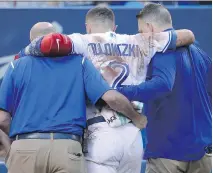  ?? TOM SZCZERBOWS­KI/GETTY IMAGES, FILE ?? Shortstop Troy Tulowitzki’s season ended for the Blue Jays on July 28 with an ankle injury.