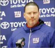  ?? MARK TENALLY — THE ASSOCIATED PRESS ?? New York Giants head coach Ben McAdoo takes questions during a press conference after an NFL football game between the New York Giants and Washington Redskins, Thursday in Landover, Md.