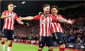  ?? Watson/Southampto­n FC/Getty Images ?? Adam Armstrong celebrates firing Southampto­n into an early lead. Photograph: Matt