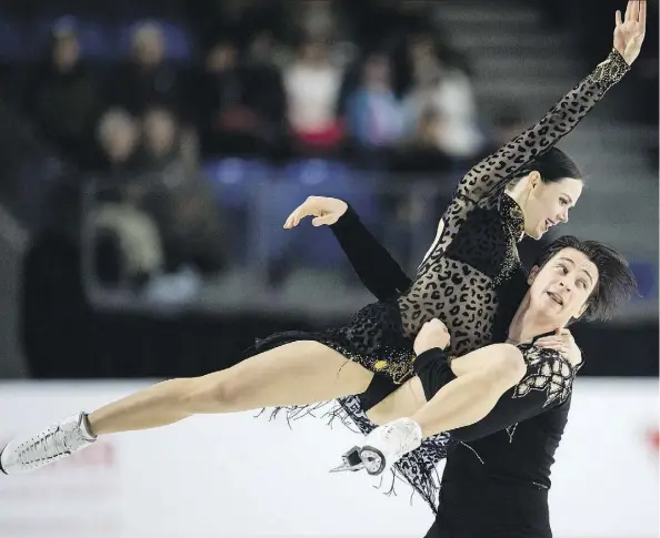  ?? JONATHAN HAYWARD/THE CANADIAN PRESS ?? Canadian ice dance darlings Tessa Virtue and Scott Moir enter the Pyeongchan­g Olympics with nothing left to prove following a gold medal at the Vancouver Games and silver at Sochi in 2014, but the desire to compete and succeed still burns inside them.