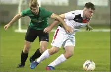  ??  ?? Mark Quinn of Square and Drogheda Town’s Adam Smith in action.