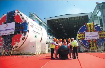  ??  ?? Najmuddin (third from right) launching the factory acceptance test for the two new tunnel boring machines in Guangzhou, China.
