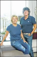  ??  ?? Ross Jones (left) and Susan Owens bought their three-bedroom, three-and-a-half-bath condo in The Brookwood on Atlanta’s Peachtree Road in 2013. Jones co-owns a restaurant in the building, Watershed on Peachtree, with Emily Saliers, of the Indigo Girls;...