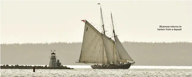  ??  ?? Bluenose returns to harbor from a daysail