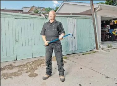  ?? ALEX SCHULDT THE HOLMES GROUP ?? Mike Holmes says the great garage was the reason he bought the property he lives on. There are different concerns with garages depending on whether they are attached to the home or a separate building.