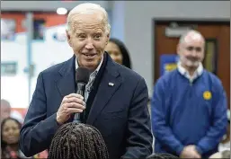  ?? EVAN VUCCI/AP ?? After campaignin­g in South Carolina, President Joe Biden addresses United Auto Workers members during a campaign stop Thursday in Warren, Mich.