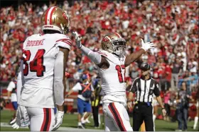  ?? BEN MARGOT - THE ASSOCIATED PRESS ?? San Francisco 49ers wide receiver Emmanuel Sanders celebrates after scoring a touchdown as wide receiver Kendrick Bourne looks on during the first half of an NFL football game against the Carolina Panthers in Santa Clara, Calif., Sunday, Oct. 27, 2019.