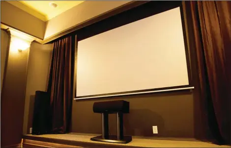  ?? METRO CREATIVE ?? Projector screens merit considerat­ion when planning your entertainm­ent room.