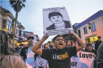  ?? Gabrielle Lurie / Special to The Chronicle 2016 ?? Jesus Ruiz calls out during a protest on 24th Street on Feb. 26, 2016, marking the one-year anniversar­y of the shooting death of Amilcar Perez-Lopez by two San Francisco plaincloth­es officers.