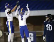  ?? [SARAH PHIPPS/ THE OKLAHOMAN] ?? Piedmont's Doran Hillman (5) celebrates his touchdown with Kameron West next to El Reno's Luke Claborn during a 24-21 win Friday.